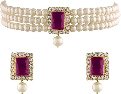 Parure de bijoux composée d'un collier de perles plaqué or 18 carats serti