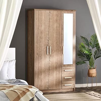Armoire courbée à trois portes home box avec miroir taille 45. DIAYTAR COTE D'IVOIRE est une boutique en ligne généraliste qui propose une large sélection de produits de haute qualité à des prix compétitifs. La boutique est leader en Côte d'Ivoire et propose plus de 300 000 références, ce qui en fait l'un des plus grands magasins en ligne du pays. Les clients peuvent profiter d'une expérience de shopping sécurisée et conviviale, avec une livraison rapide et fiable.