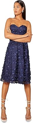 Robe mi-longue bando à motif floral 3d pour femme en bleu marine pour les occasions spéciales. DIAYTAR COTE D'IVOIRE, pionnière du commerce électronique en Cote d'Ivoire, continue d'innover et de se renforcer pour rester à la pointe du marché. La plateforme met en avant des marques locales et internationales, offrant ainsi une grande variété de produits à des prix compétitifs. Les promotions régulières et les offres spéciales font de DIAYTAR un incontournable.