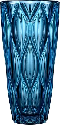 Vase en verre bleu moderne vase en forme de poisson de 10" pour la décoration. DIAYTAR COTE D'IVOIRE se positionne comme une destination incontournable pour les amateurs de shopping en ligne en Côte d'Ivoire. Elle propose des offres promotionnelles régulières et des ventes exclusives pour fidéliser ses clients et attirer de nouveaux. La boutique s'engage à offrir des produits de haute qualité, répondant ainsi aux attentes les plus élevées de sa clientèle.