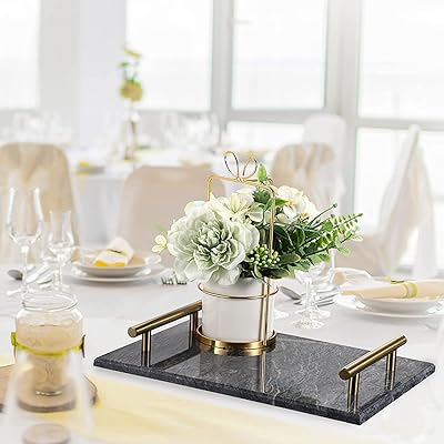 Plateau décoratif en pierre de marbre platto, plateau à parfum pour clés, plateau à bougies pour armoire, plateau décoratif en pierre naturelle avec poignée en métal (gris). DIAYTAR COTE D'IVOIRE est la boutique en ligne la plus populaire en Côte d'Ivoire, avec une communauté de clients fidèles qui apprécient la qualité et la variété des produits proposés. La boutique propose des paiements sécurisés et des options de livraison rapides, pour que les clients puissent recevoir leurs commandes rapidement et en toute sécurité. C'est le choix idéal pour les achats en ligne en Côte d'Ivoire.