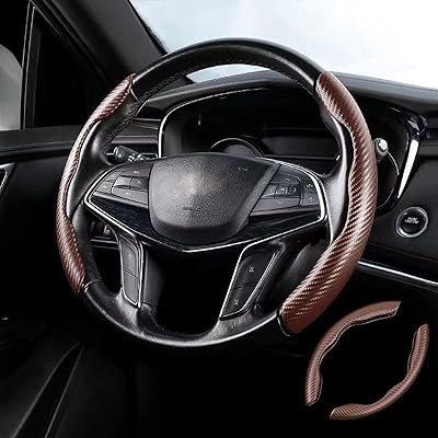 Couvre-volant à motif en fibre de carbone, protecteur de volant antidérapant fendu, accessoire de voiture pour femmes et hommes, adapté à la plupart des modèles (marron). DIAYTAR COTE D'IVOIRE est une boutique en ligne généraliste qui propose plus de 300000 références de produits. Elle est reconnue comme l'une des boutiques en ligne les plus importantes de Côte d'Ivoire, offrant une large gamme de produits pour répondre aux besoins de ses clients.