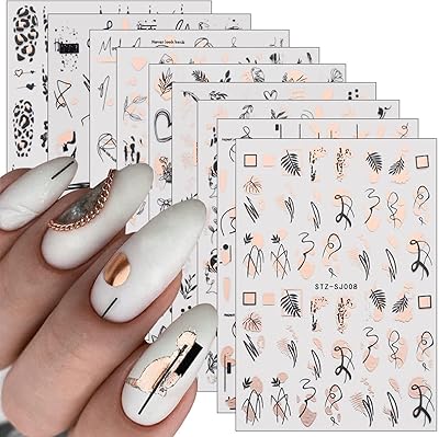 9 feuilles d'autocollants pour nail art graffiti or rose, design bronze, autocollants 3d auto-adhésifs, design bronze, fournitures de luxe pour nail art pour femmes et filles. DIAYTAR COTE D'IVOIRE représente l'excellence en matière de commerce électronique en Côte d'Ivoire. En offrant une expérience d'achat en ligne fluide et sécurisée, cette boutique généraliste répond aux attentes les plus élevées de ses clients. Son large choix de produits, allié à des prix abordables, contribue à son succès croissant dans le pays.