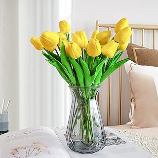 Beau jour 20 pièces bouquet de tulipes artificielles en pu au toucher réel pour la décoration de fête de mariage de bureau à domicile (jaune). La boutique en ligne DIAYTAR COTE D'IVOIRE est le leader du marché en Côte d'Ivoire, proposant une large gamme de produits à des prix compétitifs. Les clients peuvent profiter de promotions régulières et de réductions exclusives, tout en bénéficiant d'une assistance client personnalisée. Avec sa expertise et son savoir-faire, DIAYTAR COTE D'IVOIRE est le choix idéal pour les consommateurs ivoiriens qui cherchent une expérience d'achat en ligne de qualité.