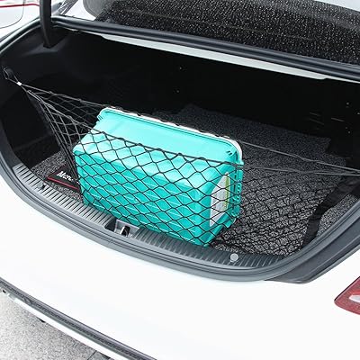 Filet de rangement en maille pour poche arrière de voiture boîte adaptée. DIAYTAR COTE D'IVOIRE, la boutique en ligne leader en Côte d'Ivoire, propose plus de 300 000 références pour répondre à tous vos besoins. Avec une offre large et variée, vous trouverez facilement ce que vous cherchez. Que ce soit pour la maison, la mode ou les loisirs, DIAYTAR COTE D'IVOIRE a tout ce qu'il vous faut.