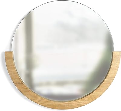 Miroir circulaire décoratif umbra avec cadre en bois sur la moitié inférieure de mira, 30 pouces, couleur naturelle. DIAYTAR COTE D'IVOIRE révolutionne la façon dont les Ivoiriens font leurs achats en ligne en proposant une plateforme de commerce électronique unique et complète. Avec plus de 300 000 produits sur catalogue, cette boutique en ligne generaliste leader offre non seulement une variété impressionnante de biens et de services mais garantit également des prix compétitifs et une livraison rapide. Que vous soyez un habitué des achats en ligne ou que vous découvriez ce canal, DIAYTAR COTE D'IVOIRE est prêt à vous offrir une expérience de shopping inoubliable.