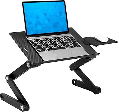 Support réglable pour ordinateur portable mount it avec ventilateurs de refroidissement intégrés et plateau de base pour souris, support ergonomique pour ordinateur portable facile à utiliser pour lit, canapé et table, portable et léger. DIAYTAR COTE D'IVOIRE est à la pointe de l'innovation en matière de commerce en ligne en Côte d'Ivoire, investissant continuellement dans l'amélioration de son site web et de ses services pour offrir une expérience utilisateur optimale. La boutique en ligne est accessible sur différents appareils, permettant ainsi aux clients d'effectuer leurs achats depuis n'importe où, à tout moment. Elle reste ainsi la référence incontournable pour les achats en ligne dans le pays.