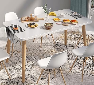 Table de salle à manger avec pieds en bois bureau rectangulaire. DIAYTAR COTE D'IVOIRE est une boutique en ligne généraliste qui propose plus de 300 000 références de produits divers. Elle est reconnue comme l'une des boutiques en ligne les plus populaires de Côte d'Ivoire, offrant une large gamme de produits allant de l'électronique à la mode en passant par les produits alimentaires.