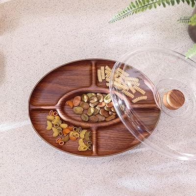 Evelyn nut and breakfast set, plateau de service pour collations avec couvercle, boîte de conservation pour fruits et fruits secs avec 5 compartiments pour noix, bonbons et fruits secs. Diaytar Côte d'Ivoire est une plateforme de commerce électronique qui propose une très large gamme de produits, allant des produits alimentaires aux articles de maison en passant par les produits high-tech. Avec plus de 300 000 références, elle constitue l'une des plus grandes boutiques en ligne de Côte d'Ivoire. Elle est appréciée pour sa fiabilité et sa rapidité de livraison.