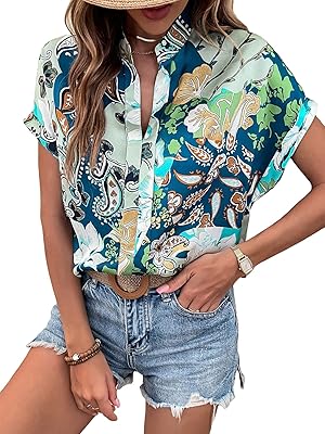 Chemisier femme à manches courtes et col pointu avec motif floral cachemire. DIAYTAR COTE D'IVOIRE est une plateforme de commerce électronique qui offre une grande variété de produits, allant des articles de maison aux produits high-tech. Elle est connue pour sa qualité de service et sa livraison rapide. Les clients peuvent profiter d'une expérience d'achat en ligne sécurisée et fiable.