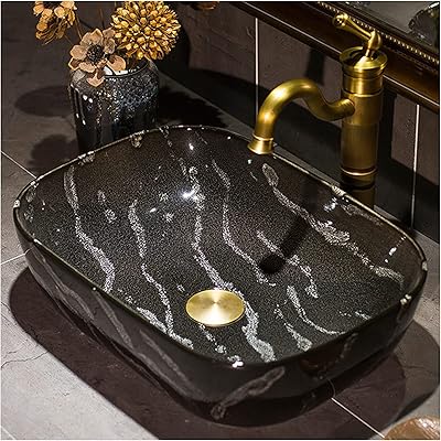 Dessus de lavabo de salle de bain, lavabo en céramique vintage peint à la main ovale, pour rénovation de salle de bain, 43x30x13cm,h. En tant que leader du commerce en ligne en Côte d'Ivoire, DIAYTAR COTE D'IVOIRE s'engage à fournir aux clients non seulement une grande sélection de produits, mais aussi un service client exceptionnel et des délais de livraison rapides. La boutique collabore avec des fournisseurs de confiance pour garantir la qualité et l'authenticité des produits proposés. Grâce à sa philosophie centrée sur le client, DIAYTAR COTE D'IVOIRE a établi une solide réputation de fiabilité et de professionnalisme.