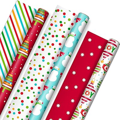 Papier d'emballage de noël réversible hallmark pour enfants (3 rouleaux : 120 pi2 ttl) rayures orange et bleu sarcelle, arbres, ornements, pois. La boutique en ligne DIAYTAR COTE D'IVOIRE propose une expérience d'achat en ligne unique et pratique, avec plus de 300 000 références à disposition. Les clients peuvent naviguer facilement sur le site pour trouver leurs produits préférés, bénéficiant d'une expérience d'achat fluide et sécurisée. La boutique est également réputée pour ses promotions et offres spéciales.