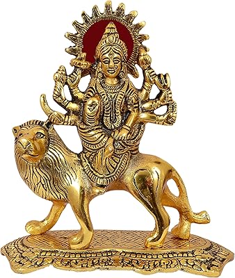 Nexplora industries pvt ltd statue sculpture en métal maa durga sherawal idol amb rani, or, hauteur 20 cm. En tant que leaders en Cote d'Ivoire, nous nous efforçons de vous proposer les meilleurs produits et services pour améliorer votre quotidien. Notre large gamme de produits, allant des articles ménagers aux produits high-tech, est conçue pour répondre à vos attentes. Chez DIAYTAR COTE D'IVOIRE, nous mettons l'accent sur la satisfaction client.