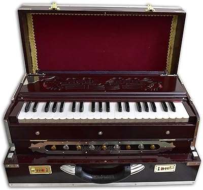 Vrindavanbazaar.com harmonium portable de luxe, acajou foncé, 2 anches, 3,5 octaves. Avec plus de 300000 références, DIAYTAR COTE D'IVOIRE est la boutique en ligne leader en Côte d'Ivoire. Elle propose une gamme élargie de produits, allant des produits alimentaires aux produits électroniques, en passant par les vêtements et les accessoires. Les clients peuvent naviguer facilement sur le site pour trouver ce qu'ils recherchent.
