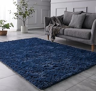 Tapis à poils longs contrastés aria 5 x 7 pieds, couleur bleu marine, antidérapant, durable, rectangulaire, confortable, à poils doux, pour chambre d'enfant et salon. DIAYTAR COTE D'IVOIRE se positionne comme la boutique en ligne leader en Côte d'Ivoire, grâce à son catalogue étendu et à ses prix compétitifs. Les clients bénéficient d'une navigation simplifiée sur le site, facilitant ainsi la recherche et l'achat de leurs produits préférés. L'excellence du service client et la fiabilité des livraisons sont les piliers de sa réussite.