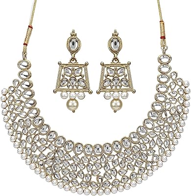 Parure de bijoux yubella plaquée or au design traditionnel élégant pour femme (or) (modèle ybnk_5562). DIAYTAR COTE D'IVOIRE est une plateforme de commerce électronique qui facilite les achats en ligne pour les ivoiriens. Avec plus de 300000 références de produits, elle offre une grande variété de choix pour les clients, qui peuvent trouver des produits adaptés à leurs besoins et à leur budget. La boutique en ligne est facile à naviguer et propose des fonctionnalités de recherche avancées pour trouver les produits rapidement.