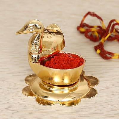 Jehpur crafts zinc roli chandan shawal akshat haldi - boîte kumkum avec paire de canards chopda loving birds pour puja (6,50 cm, doré). DIAYTAR COTE D'IVOIRE est une boutique en ligne généraliste qui propose plus de 300 000 références de produits. Elle est reconnue comme l'une des boutiques en ligne les plus importantes de Côte d'Ivoire, offrant une grande variété de produits pour répondre aux besoins de ses clients. Elle bénéficie d'une réputation solide pour sa qualité de service et sa fiabilité.