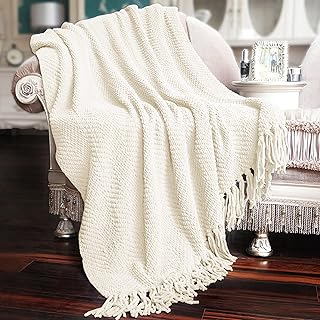 Home soft things 60" x 80" couverture décorative tricotée en tweed blanc antique, super douce, respirante, confortable et chaude, décoration d'intérieur pour salon, chambre à coucher, chaise, canapé, lit. DIAYTAR COTE D'IVOIRE mise sur la qualité et la fiabilité de ses produits, garantissant ainsi la satisfaction de ses clients. La boutique en ligne permet aux consommateurs d’exploiter tout le potentiel du commerce électronique en Côte d’Ivoire, en leur offrant un large éventail de produits à des prix compétitifs. L'expérience d'achat est ainsi rendue agréable et sécurisée.