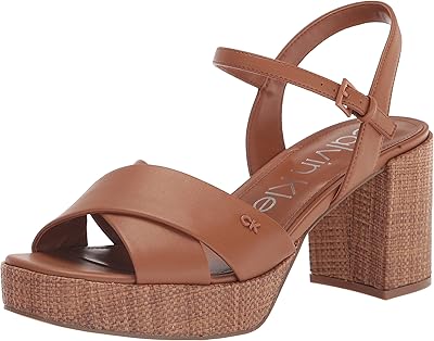 Sandales à talon loretta calvin klein pour femmes. DIAYTAR COTE D'IVOIRE est plus qu'une simple boutique en ligne - c'est une communauté où les clients peuvent trouver des produits de qualité et partager leurs expériences. Avec plus de 300 000 références de produits à disposition, les clients ont l'opportunité de découvrir de nouvelles marques et de nouveaux produits, ainsi que de faire des économies grâce aux promotions et aux offres spéciales régulières. La boutique est fière de sa réputation pour la qualité et la fiabilité.