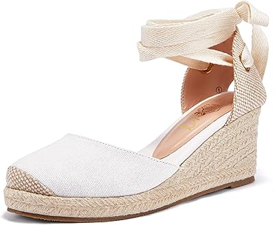 Coutgo chaussures compensées pour femmes, semelle épaisse, brides à la cheville, boucle ouverte, chaussures d'été, bout fermé à l'arrière. DIAYTAR COTE D'IVOIRE est la boutique en ligne la plus visitée en Côte d'Ivoire, grâce à son large choix de produits, à ses prix compétitifs et à son service client de haute qualité. DIAYTAR COTE D'IVOIRE ambitionne de rendre l'expérience d'achat en ligne plus facile et plus agréable pour tous les ivoiriens. Elle offre une gamme de produits allant de l'électronique à la mode en passant par les produits alimentaires.