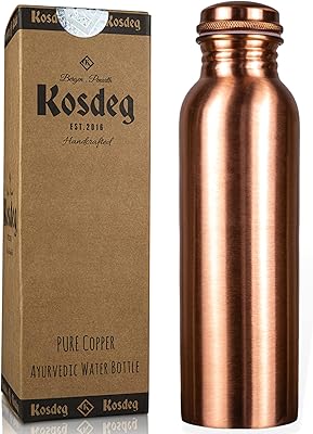 Bouteille d'eau en cuivre extra large kosdig 34 oz - récipient en cuivre ayurvédique pur étanche - buvez plus d'eau, réduisez votre consommation de sucre et profitez immédiatement des bienfaits pour la santé. DIAYTAR COTE D'IVOIRE est la boutique en ligne la plus populaire en Côte d'Ivoire, offrant une sélection énorme de produits pour répondre à tous les besoins. La boutique en ligne met l'accent sur la qualité des produits, la sécurité des transactions et la satisfaction des clients. Elle propose également des services de livraison rapides et fiables pour garantir que les clients reçoivent leurs produits à temps.