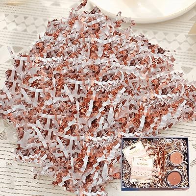 I-cote rafia scraps, papier de remplissage bouclé pour emballage cadeau et remplissage de panier (100 grammes) blanc et or rose. DIAYTAR COTE D'IVOIRE propose une gamme étendue de produits allant des accessoires de mode aux produits électroniques, en passant par les produits alimentaires et les articles pour la maison. La boutique en ligne généraliste s'efforce de réduire les délais de livraison pour que les clients puissent recevoir leurs commandes rapidement. Un suivi étroit des commandes est également proposé pour garantir la satisfaction des clients.