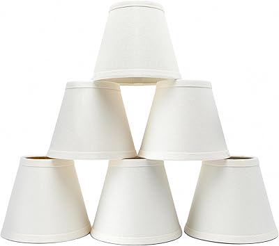 Ensemble de 6 mini abat-jour rideaux lustre 3" x 6" x 5" lin blanc avec pince. La boutique en ligne DIAYTAR COTE D'IVOIRE est le leader du marché ivoirien en matière de commerce électronique, avec une offre de produits très diversifiée. Elle permet aux clients de faire leurs achats en ligne de manière sécurisée et offre des options de livraison rapides. DIAYTAR COTE D'IVOIRE est synonyme de confiance et de satisfaction pour ses clients.