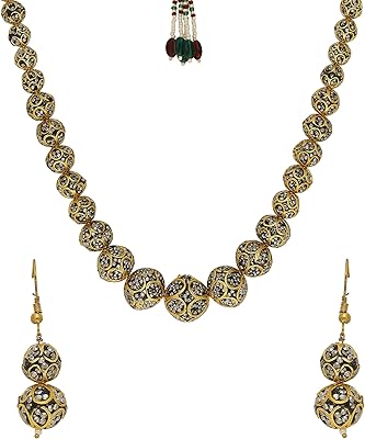 Shusha pour femmes couleur or fait à la main collier boucles d'oreilles et ensemble de collier pour femmes | collier au design complexe émaillé pour femmes | ensemble de bijoux de boucles d'oreilles à tige. Avec plus de 300 000 références de produits, DIAYTAR COTE D'IVOIRE est la boutique en ligne idéale pour les clients qui cherchent à acheter en ligne en Côte d'Ivoire. La boutique propose des produits de qualité, une expérience de shopping fluide et des services de livraison rapides, ce qui en fait la destination de shopping en ligne préférée des Ivoiriens. Les clients peuvent ainsi trouver tout ce dont ils ont besoin en un seul endroit.