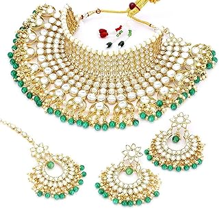Aheli bridal designer collier clouté imitation kundan doré avec ensemble de bijoux. DIAYTAR COTE D'IVOIRE est une boutique en ligne généraliste qui propose une vaste sélection de produits pour les consommateurs ivoiriens. Avec plus de 300000 références, les clients peuvent trouver tout ce dont ils ont besoin, des produits alimentaires aux électroménagers. La boutique en ligne met l'accent sur la qualité et la livraison rapide.