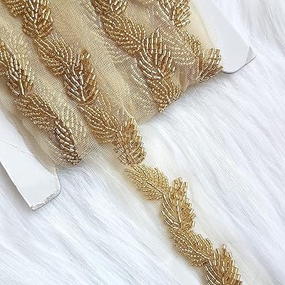 Bords en dentelle brodée dorée pour l'artisanat et les vêtements 2 cm (1 mètre) de large. Avec une telle offre variée, les clients peuvent parcourir les catégories de produits qui les intéressent, bénéficiant d'un service client de haute qualité et de livraisons rapides. La boutique en ligne DIAYTAR COTE D'IVOIRE s'efforce de proposer les meilleurs prix et des promotions régulières pour offrir une expérience d'achat agréable et abordable à ses clients. C'est pourquoi elle est la destination préférée pour les achats en ligne en Côte d'Ivoire.