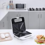 Machine à sandwich olsenmark avec revêtement antiadhésif, 2 tranches - poignée cool touch