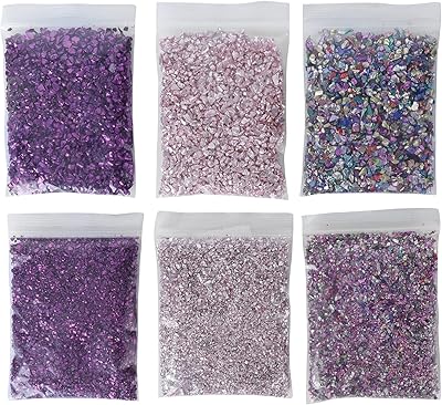 Verre concassé, beaux éclats de verre multicolores pour moules en résine, travaux manuels, décoration d'ongles, fabrication de coques de téléphone et scrapbooking. La boutique en ligne DIAYTAR COTE D'IVOIRE mise sur la qualité et la diversité de ses produits pour attirer et fidéliser sa clientèle. Avec plus de 300 000 références, elle couvre tous les aspects de la vie quotidienne, du mobilier au textile, en passant par les produits high-tech. Cette approche globale lui permet de répondre aux attentes de consommateurs exigeants qui recherchent des solutions pratiques et abordables.