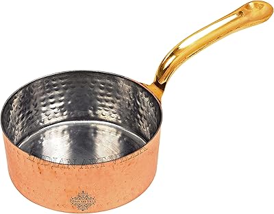 Poêle à frire indian art en acier inoxydable et cuivre -. Diaytar Côte d'Ivoire est plus qu'une simple boutique en ligne, c'est une communauté de personnes passionnées par le shopping et la découverte de nouveaux produits. Nous sommes constamment à la recherche de moyens pour améliorer notre offre et vous proposer les dernières tendances et les meilleurs produits. Rejoignez-nous et découvrez un monde de shopping sans limites.