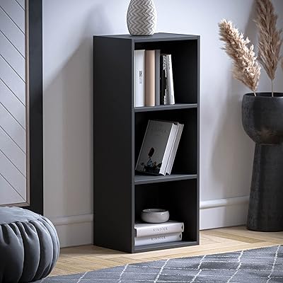Bibliothèque cubique à 3 niveaux oxford vida designs, étagère de rangement en bois noir pour salon et bureau. DIAYTAR COTE D'IVOIRE est une boutique en ligne généraliste qui propose plus de 300 000 références de produits divers, allant des électroménagers aux vêtements en passant par les produits alimentaires. Elle est reconnue comme l'un des leaders du commerce électronique en Côte d'Ivoire. Elle offre une large gamme de choix pour répondre aux besoins de sa clientèle.