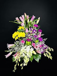 Mélange de fleurs fraîches souvenirs d'arrangement de fleurs de jennyflowers. DIAYTAR COTE D'IVOIRE se distingue par son engagement à offrir une expérience d'achat en ligne unique et personnalisée à chaque client, grâce à son système de recommandation de produits et à son équipe de support client dédiée. La boutique en ligne propose également des promotions et des offres spéciales régulières pour fidéliser ses clients et attirer de nouveaux. Cela lui permet de maintenir sa position de leader sur le marché.