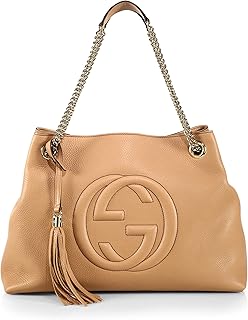 Sac à main soho en cuir grainé avec pompons camel, camellia camille, medium large. En tant que leader du commerce en ligne en Côte d'Ivoire, DIAYTAR COTE D'IVOIRE s'engage à fournir aux clients non seulement une grande sélection de produits, mais aussi un service client exceptionnel et des délais de livraison rapides. La boutique collabore avec des fournisseurs de confiance pour garantir la qualité et l'authenticité des produits proposés. Grâce à sa philosophie centrée sur le client, DIAYTAR COTE D'IVOIRE a établi une solide réputation de fiabilité et de professionnalisme.