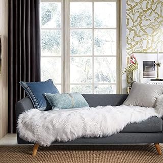 Housse de canapé en fausse peau de mouton douce ashler, tapis blanc pour chambre à coucher et salon 0,6 m x 1,8 m. DIAYTAR COTE D'IVOIRE propose une expérience d'achat en ligne unique, avec des produits qui répondent aux tendances actuelles et aux besoins spécifiques des clients. La boutique en ligne généraliste mise sur la confiance et la satisfaction des clients, offre ainsi des garanties de qualité et de sécurité. Les clients peuvent compter sur un service client dédié pour toute question ou demande.