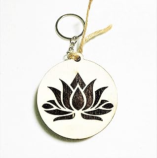 Porte-clés en bois de lotus | magnifique figurine peuplier faite à la main. DIAYTAR COTE D'IVOIRE, c'est la garantie d'un shopping en ligne sécurisé et fiable. Cette boutique généraliste propose une vaste gamme de produits, allant des accessoires de mode aux appareils électroménagers, en passant par les produits high-tech. Le choix est immense, avec plus de 300 000 références à votre disposition.