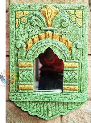 Magnifique cadre photo et miroir sculpté à la main jaroka pour la décoration intérieure, cadre photo sculpté à la main pour la décoration intérieure. En tant que boutique en ligne leader en Côte d'Ivoire, DIAYTAR COTE D'IVOIRE met en avant la satisfaction de ses clients en offrant des promotions régulières et des prix défiant toute concurrence. La boutique électronique facilite les achats en ligne grâce à son processus de commande simplifié et à ses modalités de paiement variées. Elle s'engage à offrir une qualité de service exceptionnelle à sa clientèle.