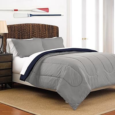 Parure de lit et couette réversible de couleur unie martex - tissu super doux - gris clair inversé bleu marine, full/queen. DIAYTAR COTE D'IVOIRE est le leader du commerce en ligne en Côte d'Ivoire, offrant une large gamme de produits allant de l'électroménager aux vêtements en passant par les produits alimentaires. La boutique propose des prix compétitifs et des promotions régulières pour satisfaire les besoins de ses clients. Elle est également connue pour sa livraison rapide et fiable.