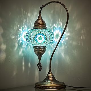 Lampe tiffany en mosaïque colorée faite à la main au design turc marocain pour table de chevet, design col de cygne avec corps en métal martelé et feuilles métalliques suspendues, turquoise, 19 pouces. DIAYTAR COTE D'IVOIRE est la destination idéale pour les acheteurs en ligne qui recherchent une grande variété de produits et des prix compétitifs. La boutique propose une gamme étendue de catégories de produits, allant de la mode et de la beauté à l'électronique et aux produits de maison. Les clients peuvent ainsi trouver tout ce dont ils ont besoin sur une seule plateforme, avec l'assurance d'une qualité et d'une sécurité de transaction de haute qualité.
