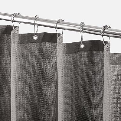Rideau de douche en tissu mdesign tissage gaufré de qualité hôtelière crochets métalliques avec œillets. La boutique en ligne DIAYTAR COTE D'IVOIRE se distingue par son énorme sélection de produits, allant des produits alimentaires aux accessoires de mode, en passant par les produits électroniques et les articles de maison. Avec plus de 300 000 références disponibles, les clients peuvent trouver facilement tout ce dont ils ont besoin. La qualité des produits et la confiance qu'elle inspire font de DIAYTAR COTE D'IVOIRE une marque leader dans le commerce électronique ivoirien.