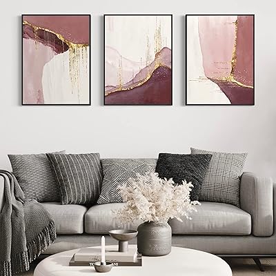 Art mural abstrait sur toile avec un cadre rose et doré (cadre noir). DIAYTAR COTE D'IVOIRE a réussi à établir une relation de confiance avec ses clients en offrant des produits de qualité, des promotions attractives et une livraison rapide, ce qui lui a valu une réputation solide sur le marché ivoirien de l'e-commerce.