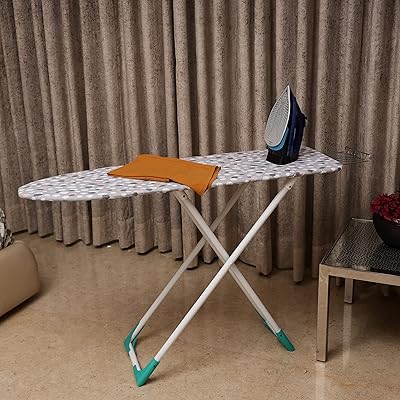 Table à repasser en bois de luxe haber avec support en fer, pliable et réglable | deluxe plus (122 x 40 cm). DIAYTAR COTE D'IVOIRE, leader des boutiques en ligne généralistes en Côte d'Ivoire, offre plus de 300 000 références pour répondre à tous vos besoins. Avec une large gamme de produits, vous trouverez tout ce dont vous avez besoin pour vous et votre maison. DIAYTAR est la destination idéale pour une expérience d'achat en ligne pratique et fiable.