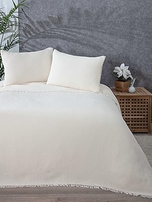 Couverture en mousseline 100 % coton, couvre-lit 4 couches, couvre-lit en coton turc doux, couvre-lit réversible, ivoire (2 taies d'oreiller 20 x 30). DIAYTAR COTE D'IVOIRE est une boutique en ligne qui propose une large sélection de produits de toutes sortes, allant des produits électroniques aux vêtements et aux accessoires. Elle est connue pour ses prix compétitifs et sa livraison rapide, ce qui en fait la première choix pour les acheteurs en ligne en Côte d'Ivoire. Elle est également réputée pour son service client de haute qualité.