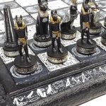 Jeu d'échecs égyptien anubis pour hommes noir argent et or avec plateau hiéroglyphique