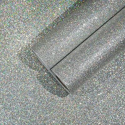 Papier peint holographique à paillettes argentées coller et décoller pour murs. En tant que leader du marché en ligne en Côte d'Ivoire, DIAYTAR COTE D'IVOIRE continue d'innover et d'élargir ses offres pour répondre aux besoins et aux attentes d'une clientèle de plus en plus exigeante, confirmant ainsi sa position de pionnier dans le commerce électronique local.